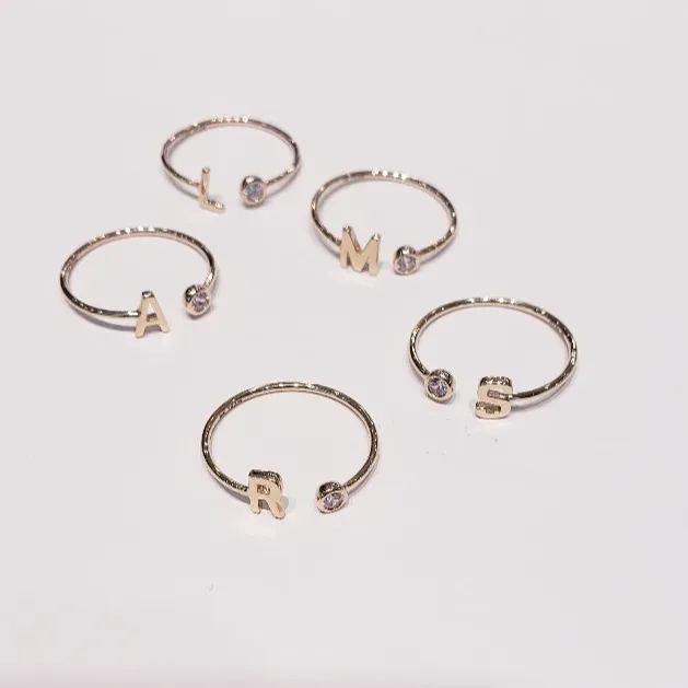 10kt Yellow Gold Mini Block initial rings with floating CZ stone